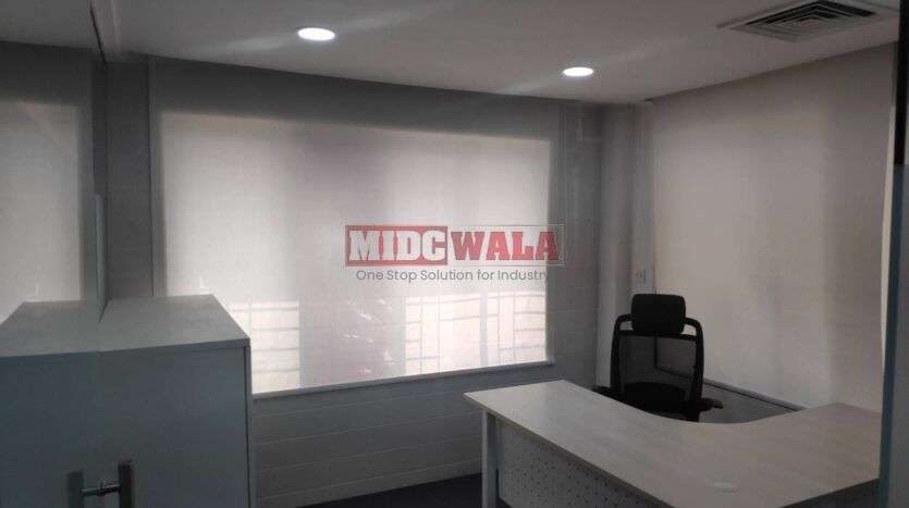 An image showcasing a office space in MBP, Mahape, Navi Mumbai, featuring modern workstations, well-appointed conference rooms, and a vibrant work environment.