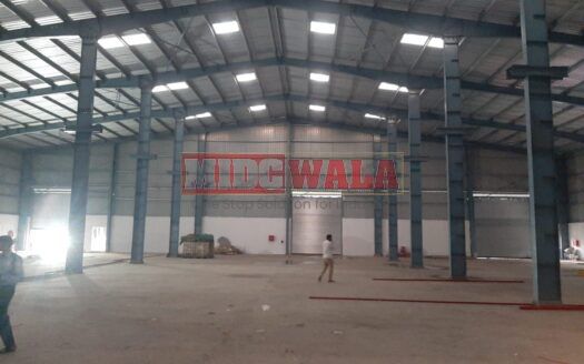 Large, modern warehouse in TTC Industrial Area, Pawane, Navi Mumbai. Suitable for storage and distribution.