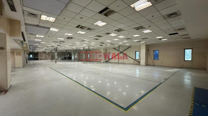 A spacious and modern RCC industrial building available for lease in Navi Mumbai's Koper khairane Midc, TTC Industrial area. The building features abundant workspace, contemporary amenities, and a strategic location.