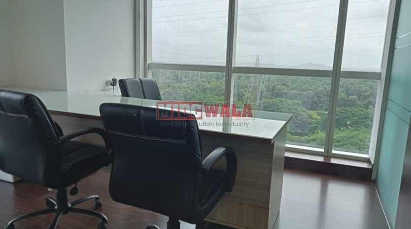 An image showcasing a fully furnished office space at Kesar Solitaire, Palm Beach Road, Navi Mumbai, featuring modern workstations, well-appointed conference rooms, and a vibrant work environment.