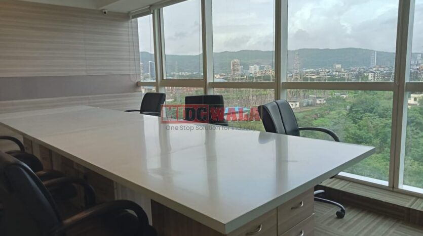 An image showcasing a fully furnished office space at Kesar Solitaire, Palm Beach Road, Navi Mumbai, featuring modern workstations, well-appointed conference rooms, and a vibrant work environment.