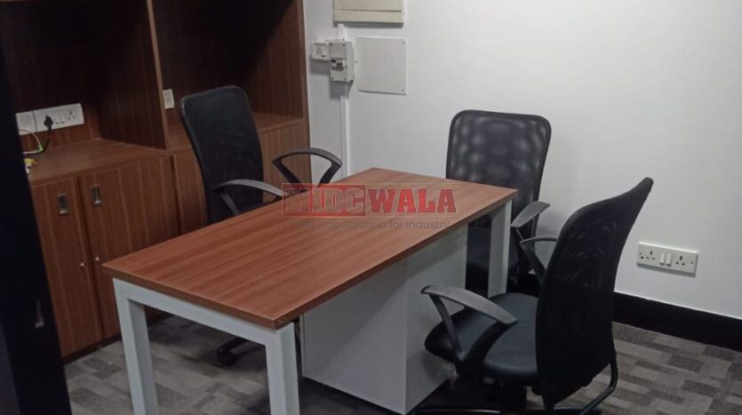 An image showcasing a fully furnished office space in, MBP, Mahape, Navi Mumbai, featuring modern workstations, well-appointed conference rooms, and a vibrant work environment.