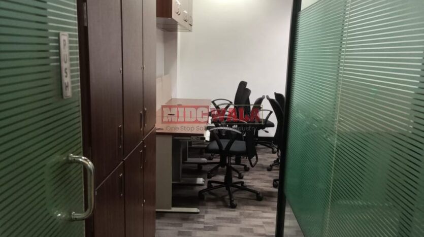 An image showcasing a fully furnished office space in, MBP, Mahape, Navi Mumbai, featuring modern workstations, well-appointed conference rooms, and a vibrant work environment.