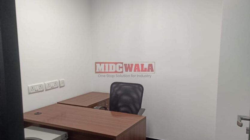 An image showcasing a fully furnished office space in, MBP, Mahape, Navi Mumbai, featuring modern workstations, well-appointed conference rooms, and a vibrant work environment.