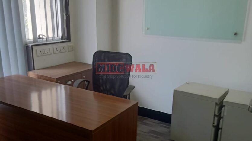 An image showcasing a fully furnished office space in, MBP, Mahape, Navi Mumbai, featuring modern workstations, well-appointed conference rooms, and a vibrant work environment.