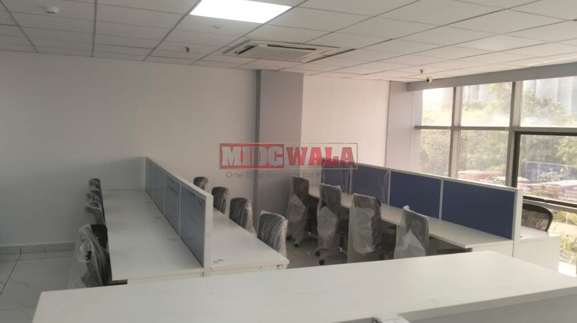 An image showcasing a fully furnished office space at Akshar business park Vashi, Navi Mumbai, featuring modern workstations, well-appointed conference rooms, and a vibrant work environment.