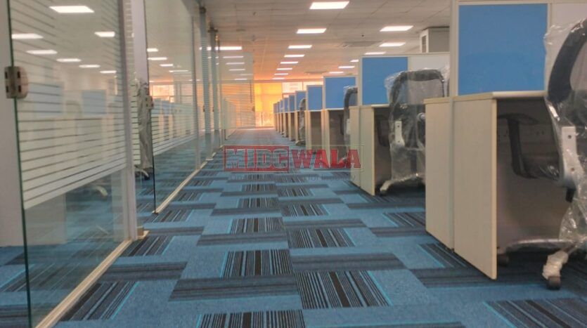 An image showcasing a fully furnished office space at Akshar Business Park, Vashi, Navi Mumbai, featuring modern workstations, well-appointed conference rooms, and a vibrant work environment.