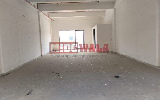 G+6 industrial building with 20,000 sq. ft. plot, carpeted area, loft, terrace, and high visibility in Taloja MIDC. (MIDCWALA 15)