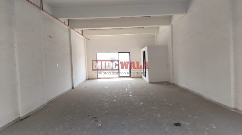 G+6 industrial building with 20,000 sq. ft. plot, carpeted area, loft, terrace, and high visibility in Taloja MIDC. (MIDCWALA 15)