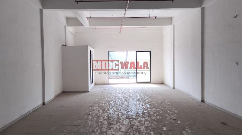 G+6 industrial building with 20,000 sq. ft. plot, carpeted area, loft, terrace, and high visibility in Taloja MIDC. (MIDCWALA 15)