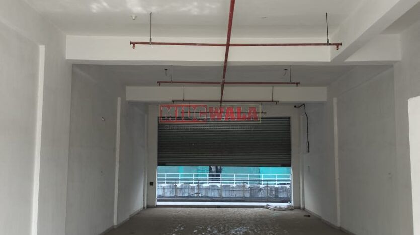 G+6 industrial building with 20,000 sq. ft. plot, carpeted area, loft, terrace, and high visibility in Taloja MIDC. (MIDCWALA 15)