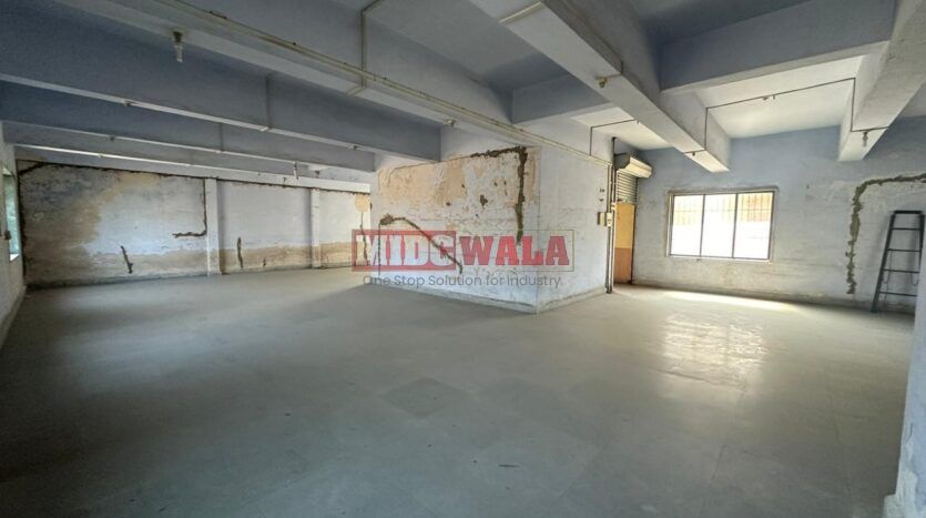 Spacious industrial warehouse available for lease in Koperkhairne, Navi Mumbai, offering ample space for production, storage, and distribution. (MIDCWALA )