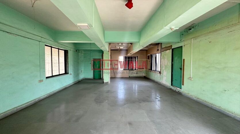 Spacious industrial warehouse available for lease in Koperkhairne, Navi Mumbai, offering ample space for production, storage, and distribution. (MIDCWALA )