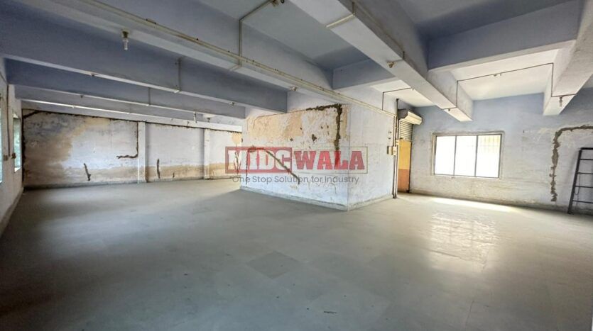 Spacious industrial warehouse available for lease in Koperkhairne, Navi Mumbai, offering ample space for production, storage, and distribution. (MIDCWALA )