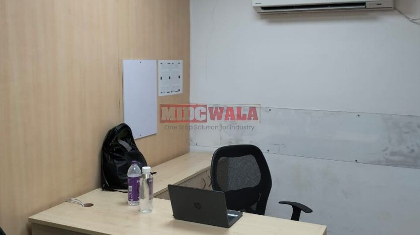 An image showcasing a fully furnished office space at Rupa Solitaire, MBP, Mahape, Navi Mumbai, featuring modern workstations, well-appointed conference rooms, and a vibrant work environment.