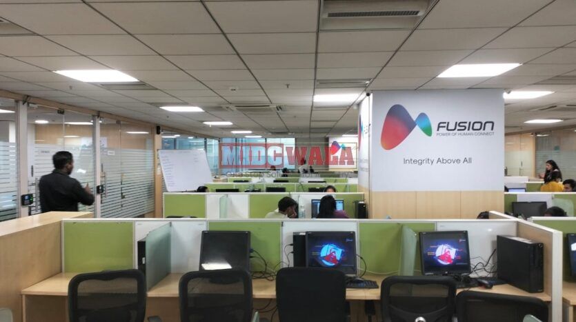 An image showcasing a fully furnished office space at Rupa Solitaire, MBP, Mahape, Navi Mumbai, featuring modern workstations, well-appointed conference rooms, and a vibrant work environment.