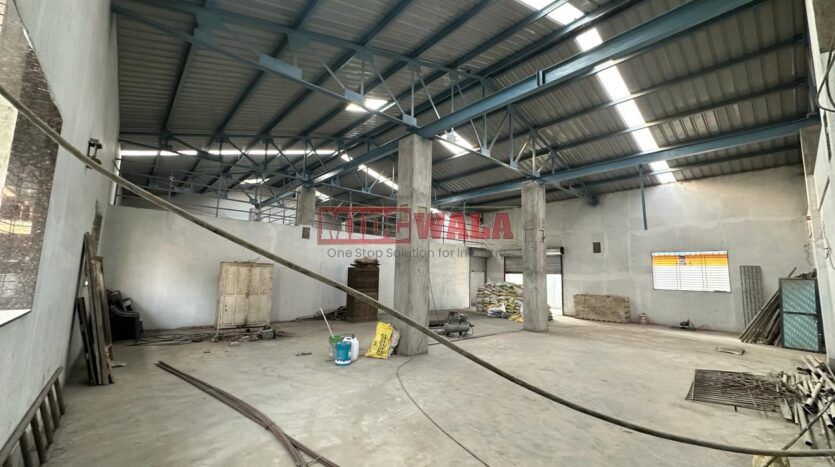 Spacious industrial warehouse available for lease in Koparkhairne, Navi Mumbai, offering ample space for production, storage, and distribution. (MIDCWALA )