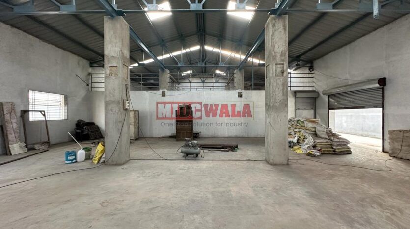 Spacious industrial warehouse available for lease in Koparkhairne, Navi Mumbai, offering ample space for production, storage, and distribution. (MIDCWALA )