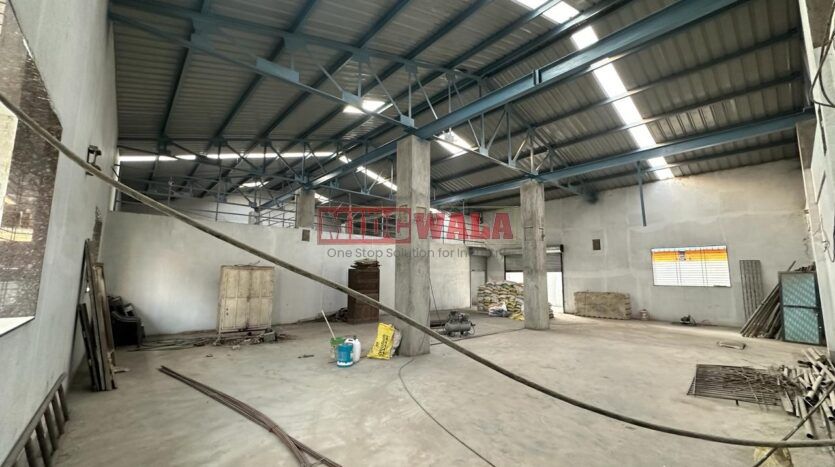 Spacious industrial warehouse available for lease in Koparkhairne, Navi Mumbai, offering ample space for production, storage, and distribution. (MIDCWALA )