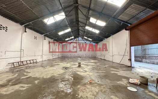 Spacious industrial warehouse available for lease in Mahape, Navi Mumbai, offering ample space for production, storage, and distribution. (MIDCWALA )