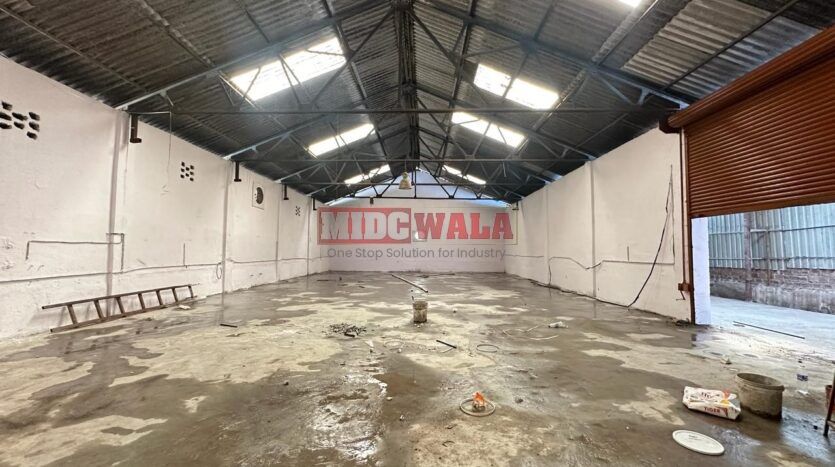 Spacious industrial warehouse available for lease in Mahape, Navi Mumbai, offering ample space for production, storage, and distribution. (MIDCWALA )