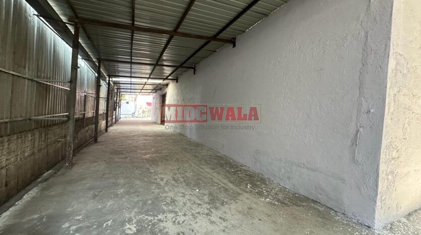 Spacious industrial warehouse available for lease in Mahape, Navi Mumbai, offering ample space for production, storage, and distribution. (MIDCWALA )