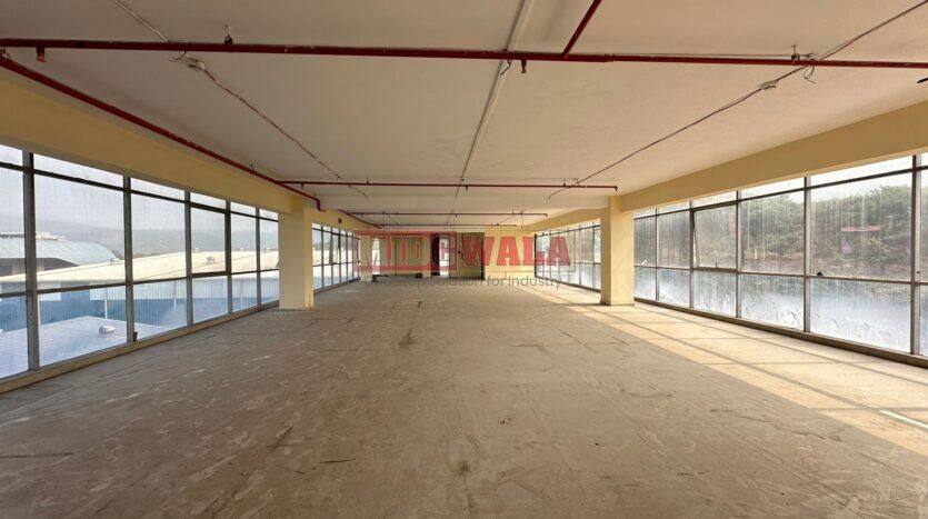 Spacious industrial warehouse available for lease in Mahape, Navi Mumbai, offering ample space for production, storage, and distribution. (MIDCWALA )