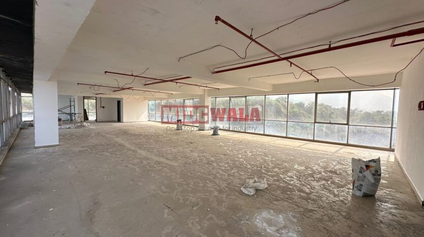 Spacious industrial warehouse available for lease in Mahape, Navi Mumbai, offering ample space for production, storage, and distribution. (MIDCWALA )