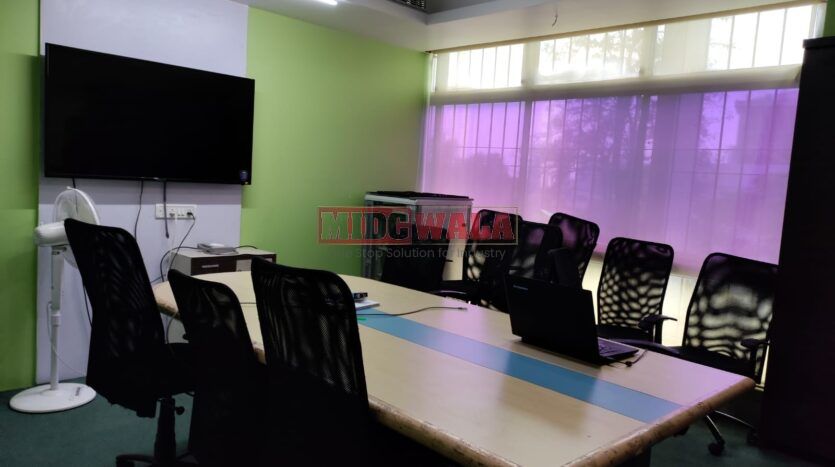 An image showcasing a fully furnished office space at Aryan Business, MBP, Mahape, Navi Mumbai, featuring modern workstations, well-appointed conference rooms, and a vibrant work environment.