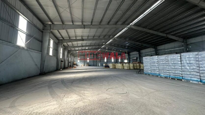 Spacious industrial warehouse available for lease in JNPT, Navi Mumbai, offering ample space for production, storage, and distribution. (MIDCWALA )