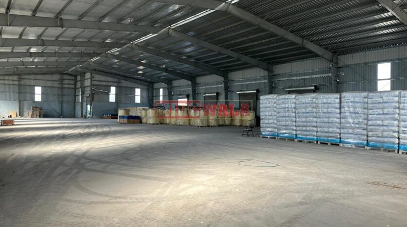 Spacious industrial warehouse available for lease in JNPT, Navi Mumbai, offering ample space for production, storage, and distribution. (MIDCWALA )