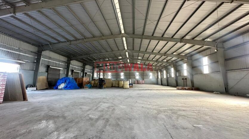 Spacious industrial warehouse available for lease in JNPT, Navi Mumbai, offering ample space for production, storage, and distribution. (MIDCWALA )