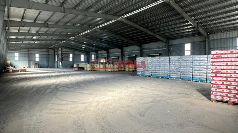 Spacious industrial warehouse available for lease in JNPT, Navi Mumbai, offering ample space for production, storage, and distribution. (MIDCWALA )