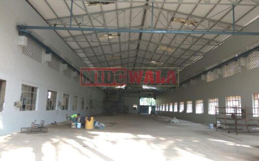 large industrial shed with overhead doors and loading dock in Nerul MIDC, Navi Mumbai.