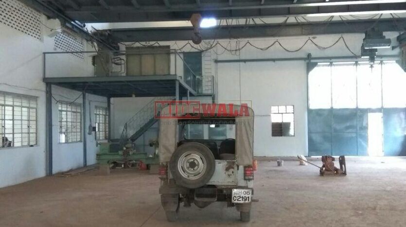 large industrial shed with overhead doors and loading dock in Nerul MIDC, Navi Mumbai.