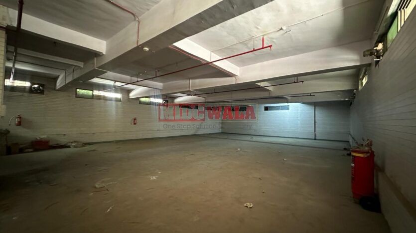 Industrial building for sale in Mahape, Navi Mumbai. Suitable for warehousing, manufacturing, or distribution.