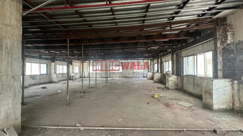 Industrial building for sale in Mahape, Navi Mumbai. Suitable for warehousing, manufacturing, or distribution.