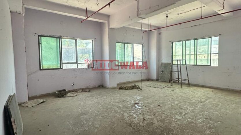 Industrial building for sale in Mahape, Navi Mumbai. Suitable for warehousing, manufacturing, or distribution.