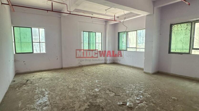 Industrial building for sale in Mahape, Navi Mumbai. Suitable for warehousing, manufacturing, or distribution.