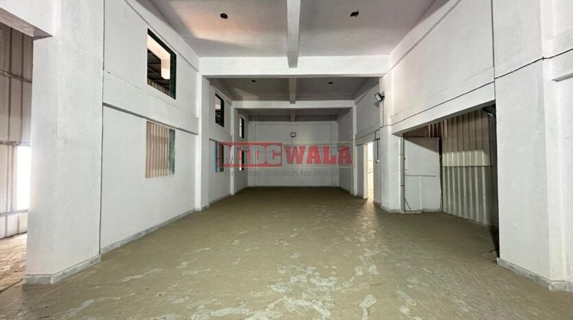 Warehouse for lease in Rabale, Navi Mumbai with loading docks.