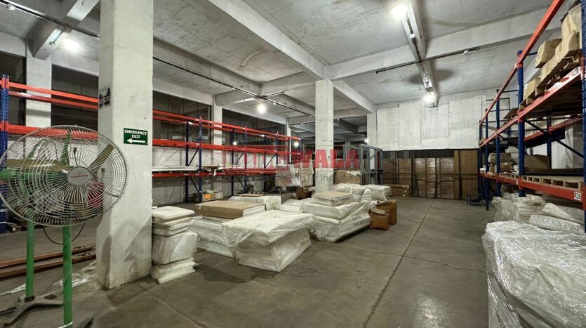 Industrial warehouse with large doors and loading docks