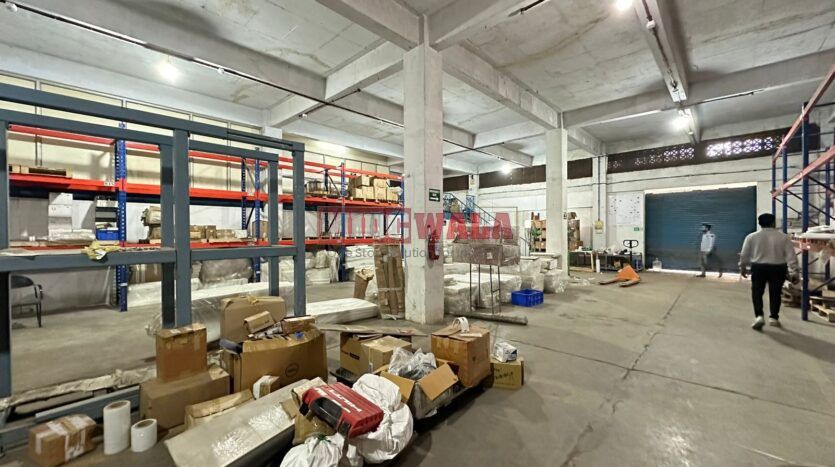 Industrial warehouse with large doors and loading docks